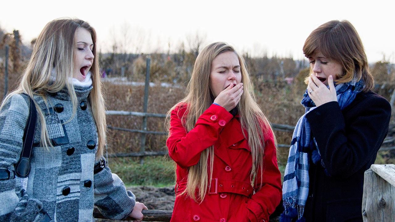 Groop of girls yawning